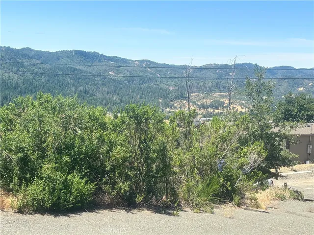 a view of a mountain with a outdoor space