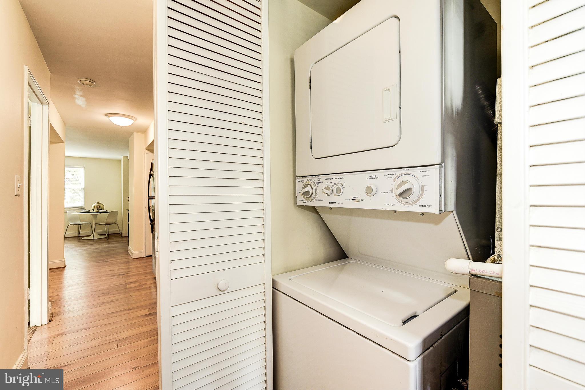 131 17th Street Southeast, Unit 2 Washington, DC 20003 - Photo 12 of 15 a utility room with dryer and washer