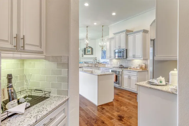 a living room with furniture and a gate