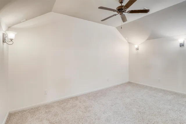 a view of a porch with chairs and backyard