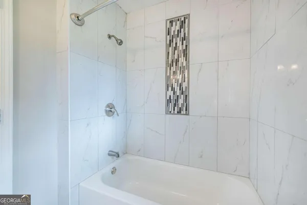 a bathroom with a bathtub