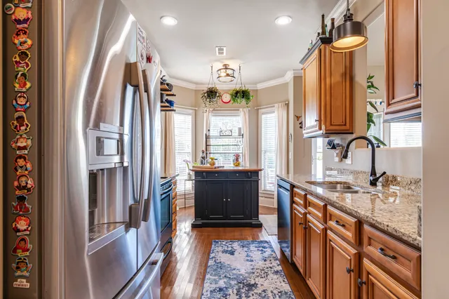 a living room with furniture gym equipment and a flat screen tv