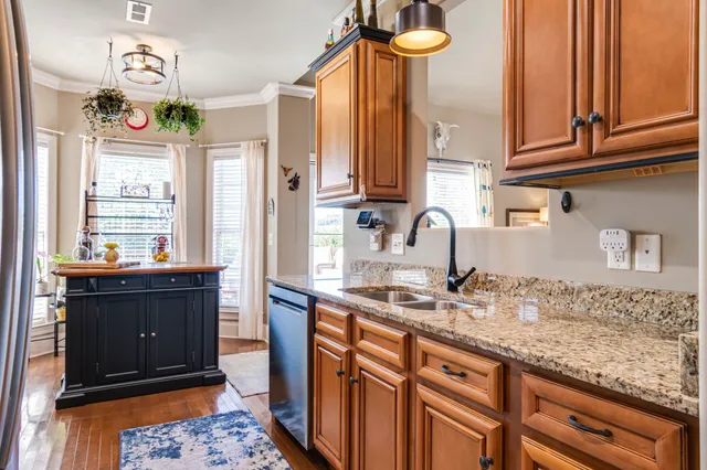 a view of balcony with furniture and wooden deck