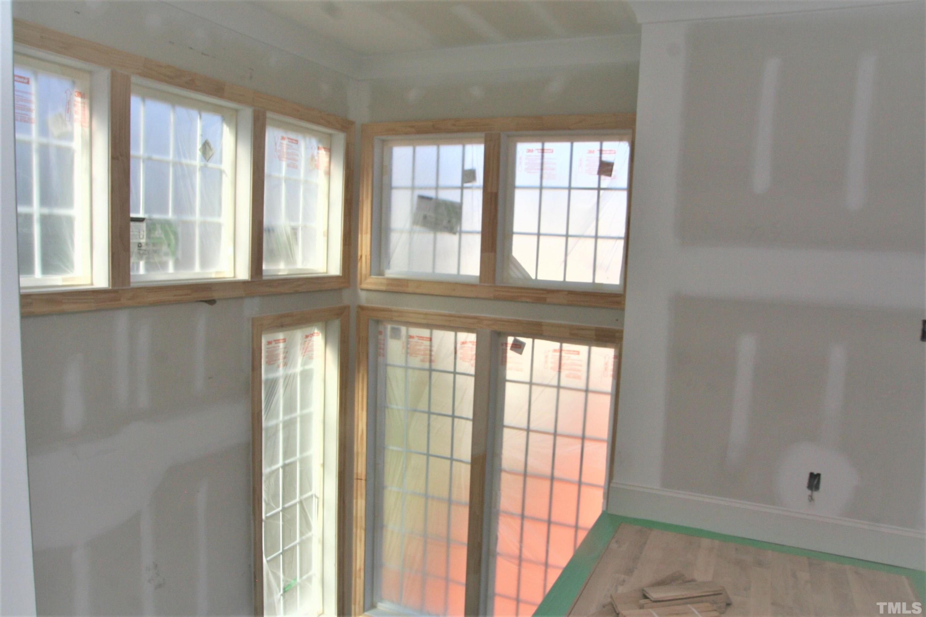 3027 Farrior Road Raleigh, NC 27607 - Photo 18 of 18 a view of an empty room with a window