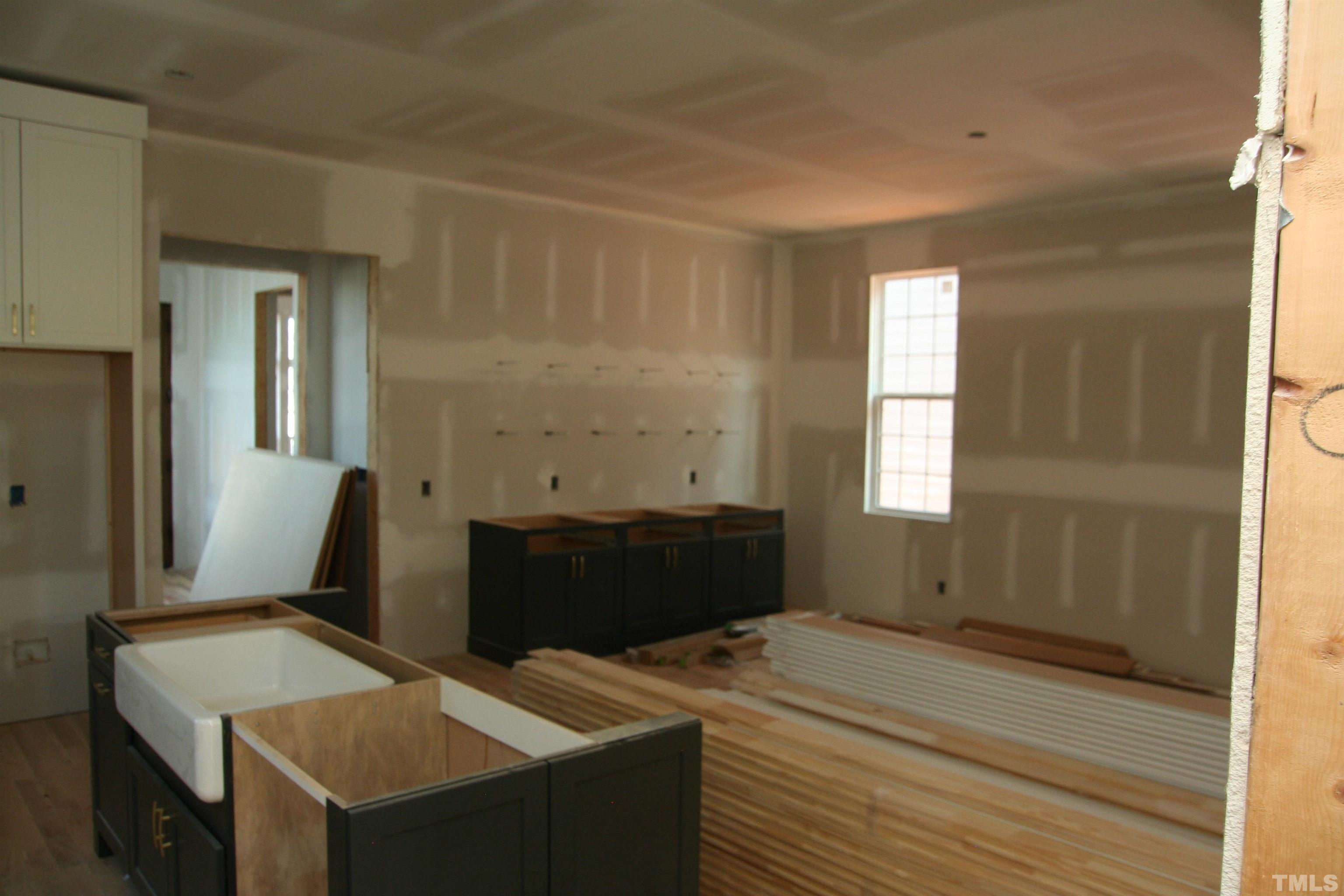 3027 Farrior Road Raleigh, NC 27607 - Photo 5 of 18 a bedroom with a bed and a dresser