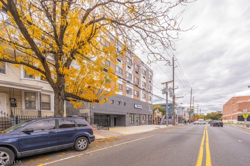 768 Bergen Street, Unit 5D Newark, NJ 07108 - Photo 13 of 14 a car parked in front of a building