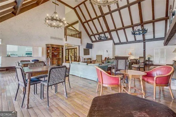 a room with lots of wooden furniture and lots of furniture