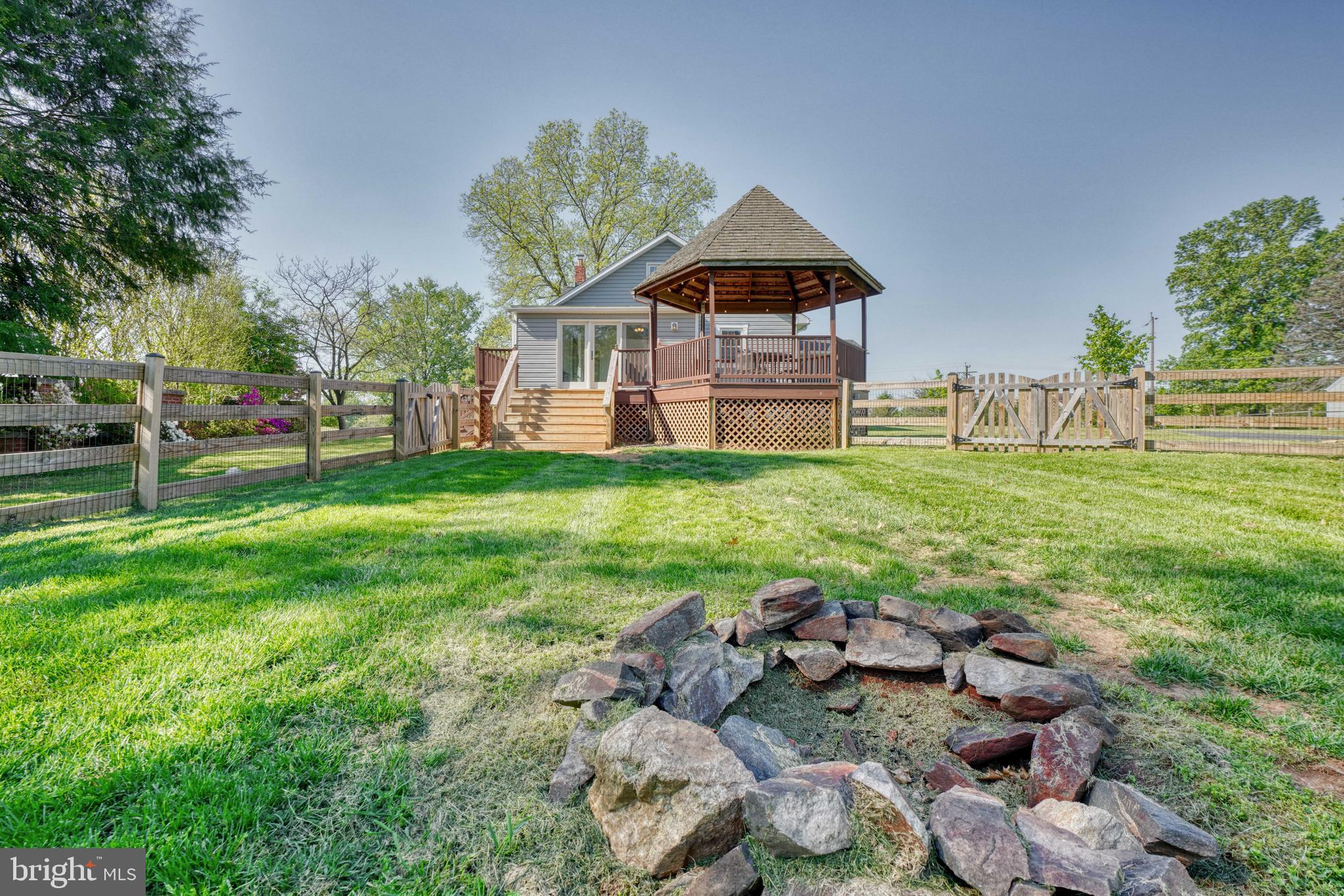 7800 Chapman Road Kingsville, MD 21087 - Photo 38 of 42 Firepit and gazebo