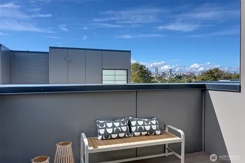 a view of balcony with furniture