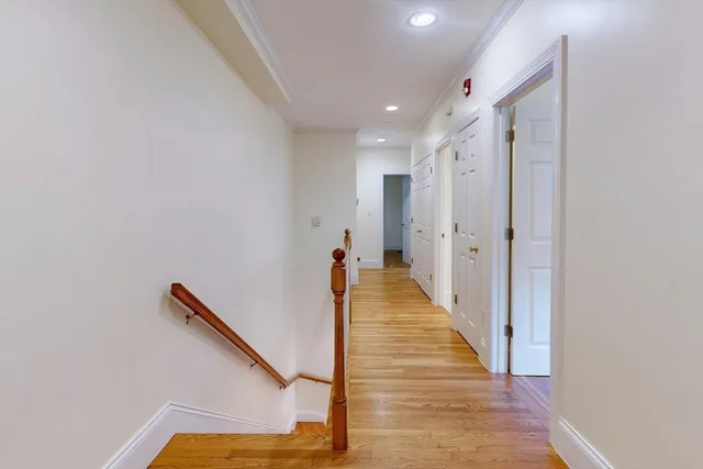a view of a hallway with staircase