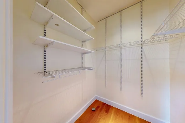 a view of a room with racks on the wall