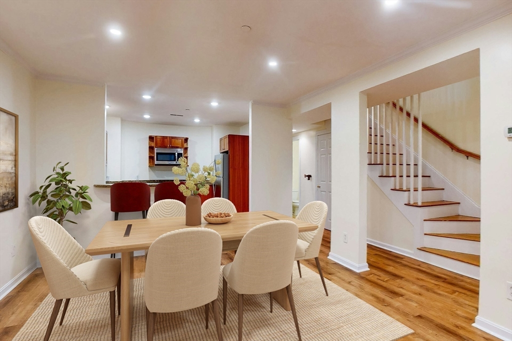 460 Massachusetts Avenue, Unit B Boston, MA 02118 - Photo 4 of 23 a view of a dining room with furniture