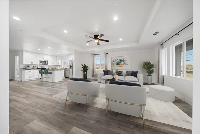 a living room with furniture and a table