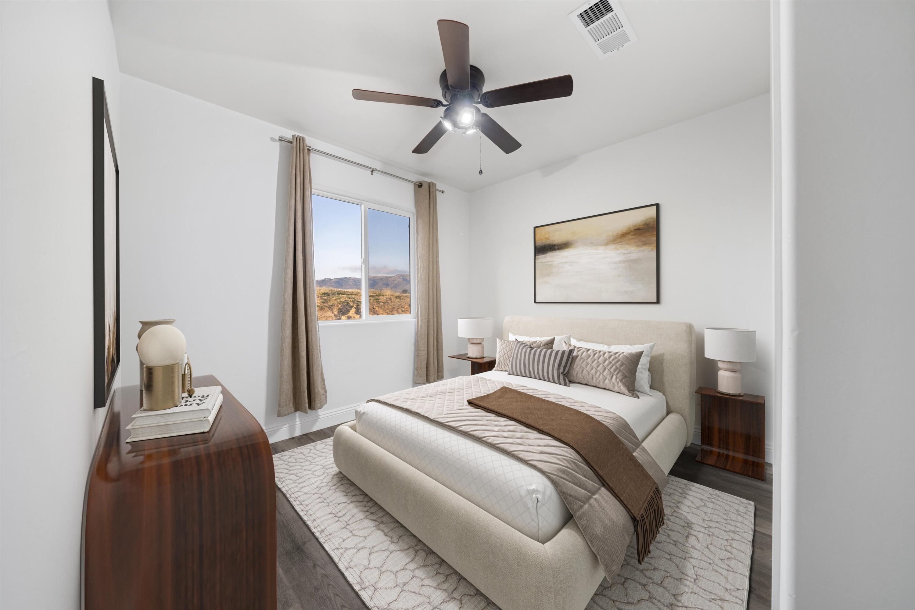 20601 Country Club Drive Tehachapi, CA 93561 - Photo 8 of 18 a bedroom with a bed and window