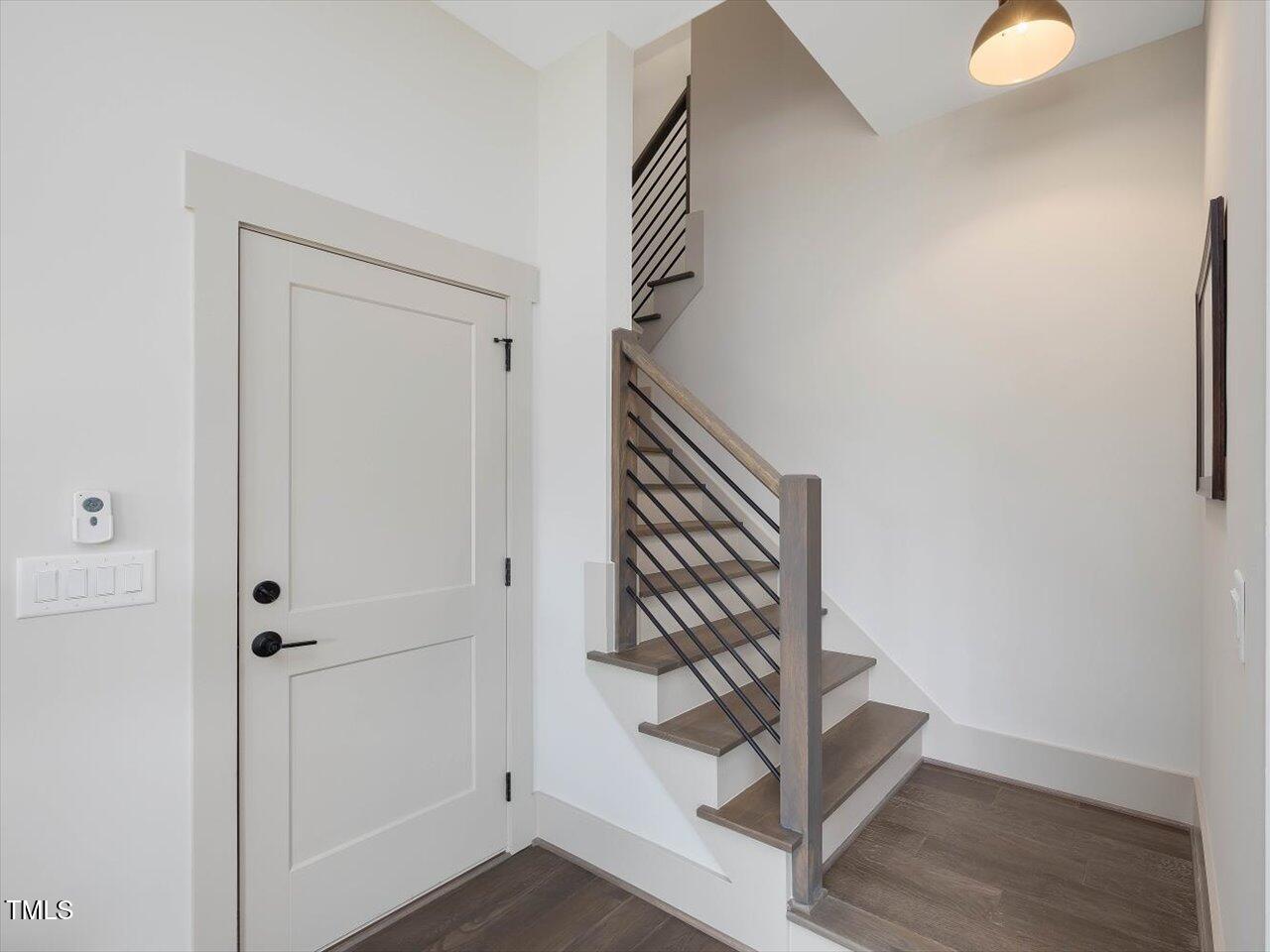734 South State Street Raleigh, NC 27601 - Photo 67 of 95 a view of entryway with wooden floor