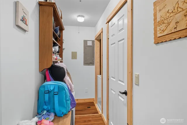 a view of washer and dryer with bathroom