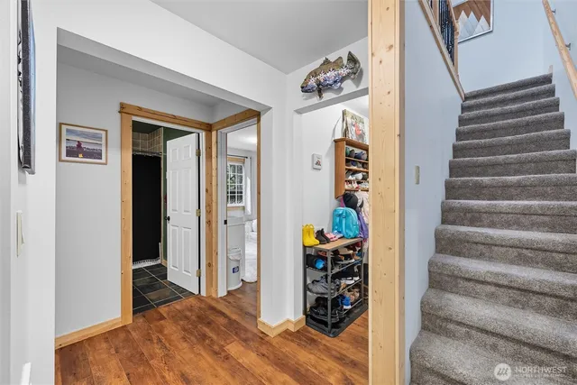 a view of a hallway with entryway to a house