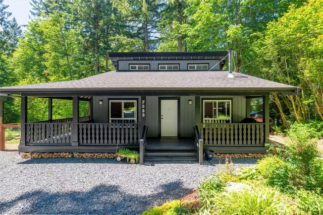 a view of a house with a garden