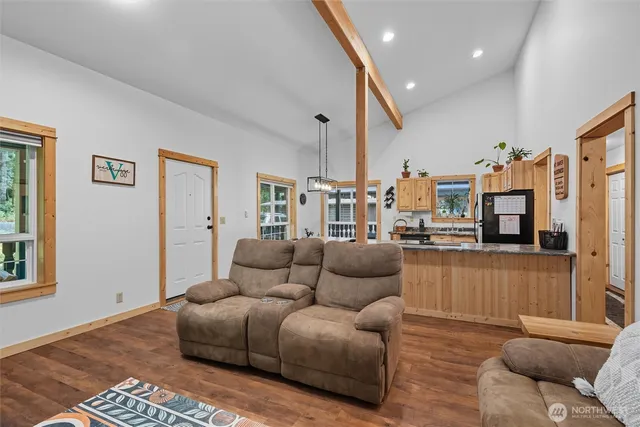 a kitchen with stainless steel appliances granite countertop a stove and more cabinets