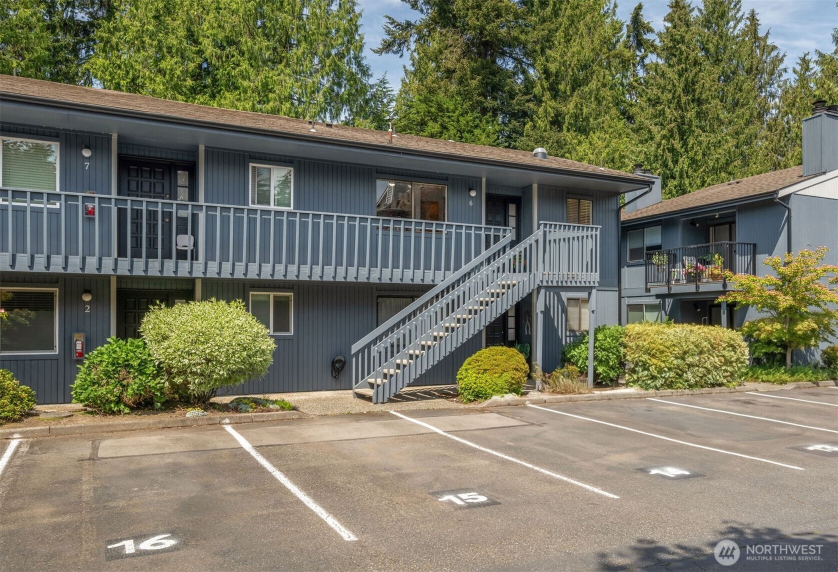 8017 196th Street Southwest, Unit 6B Edmonds, WA 98026 - Photo 21 of 23 a view of a house with sitting area and potted plants
