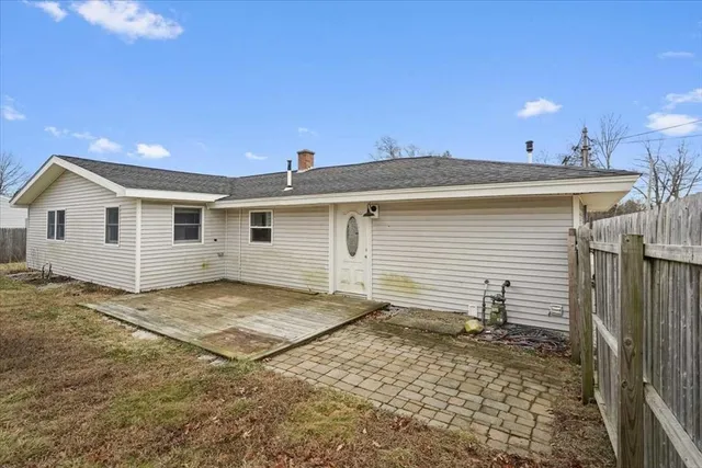 a bathroom with a sink and a yard
