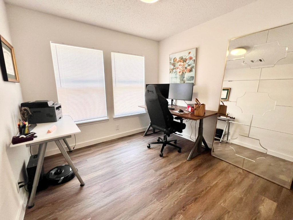 3204 Elizabeth Anne Lane Round Rock, TX 78664 - Photo 10 of 17 a view of a workspace with furniture and a window