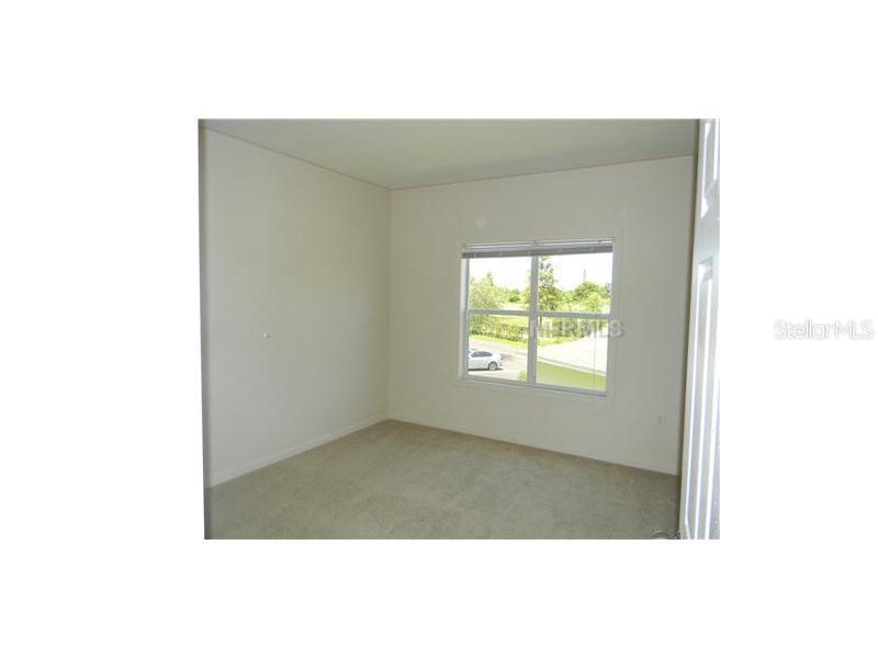 4802 51st Street West, Unit 1224 Bradenton, FL 34210 - Photo 7 of 10 a picture of a small white wall