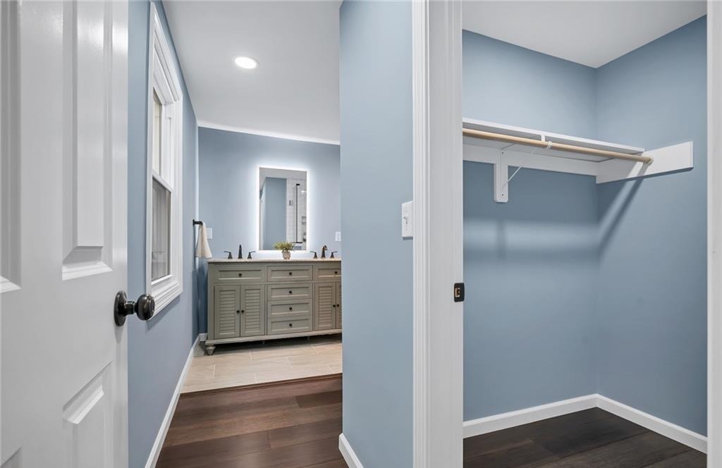 346 Middlebury Road Middlebury, CT 06762 - Photo 12 of 22 a view of a hallway with closet and wooden floor