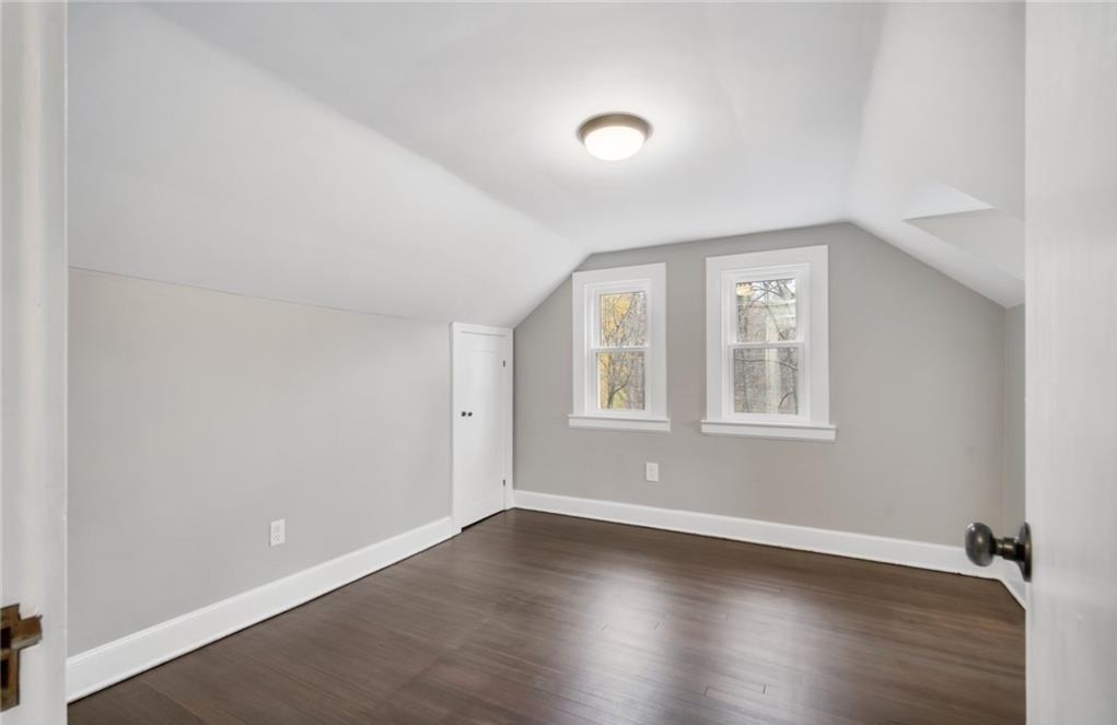 346 Middlebury Road Middlebury, CT 06762 - Photo 16 of 22 an empty room with wooden floor and windows