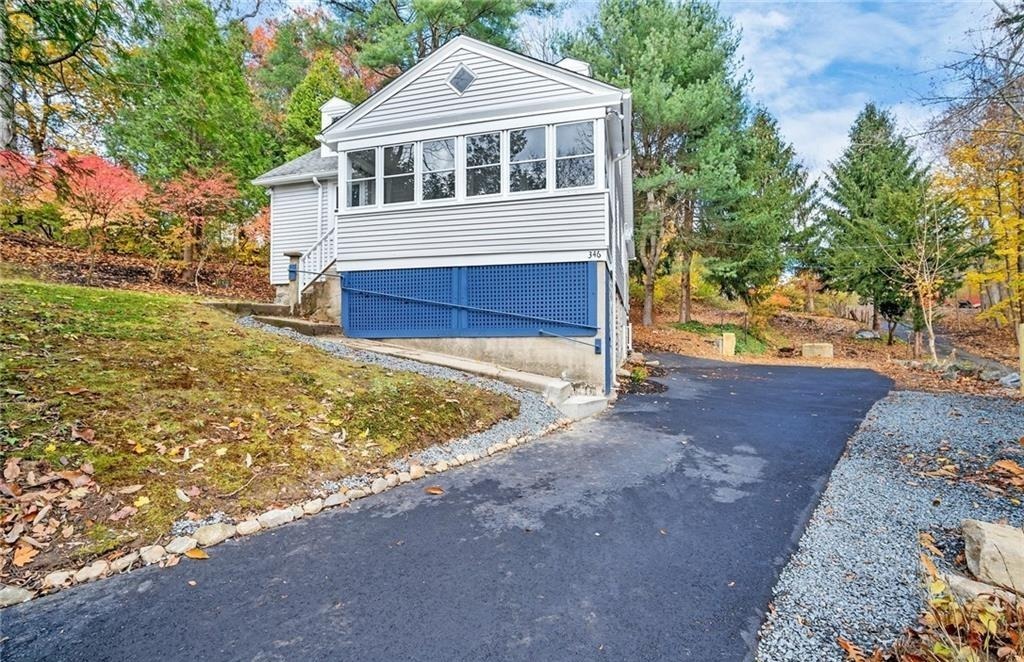 346 Middlebury Road Middlebury, CT 06762 - Photo 19 of 22 a front view of house with yard