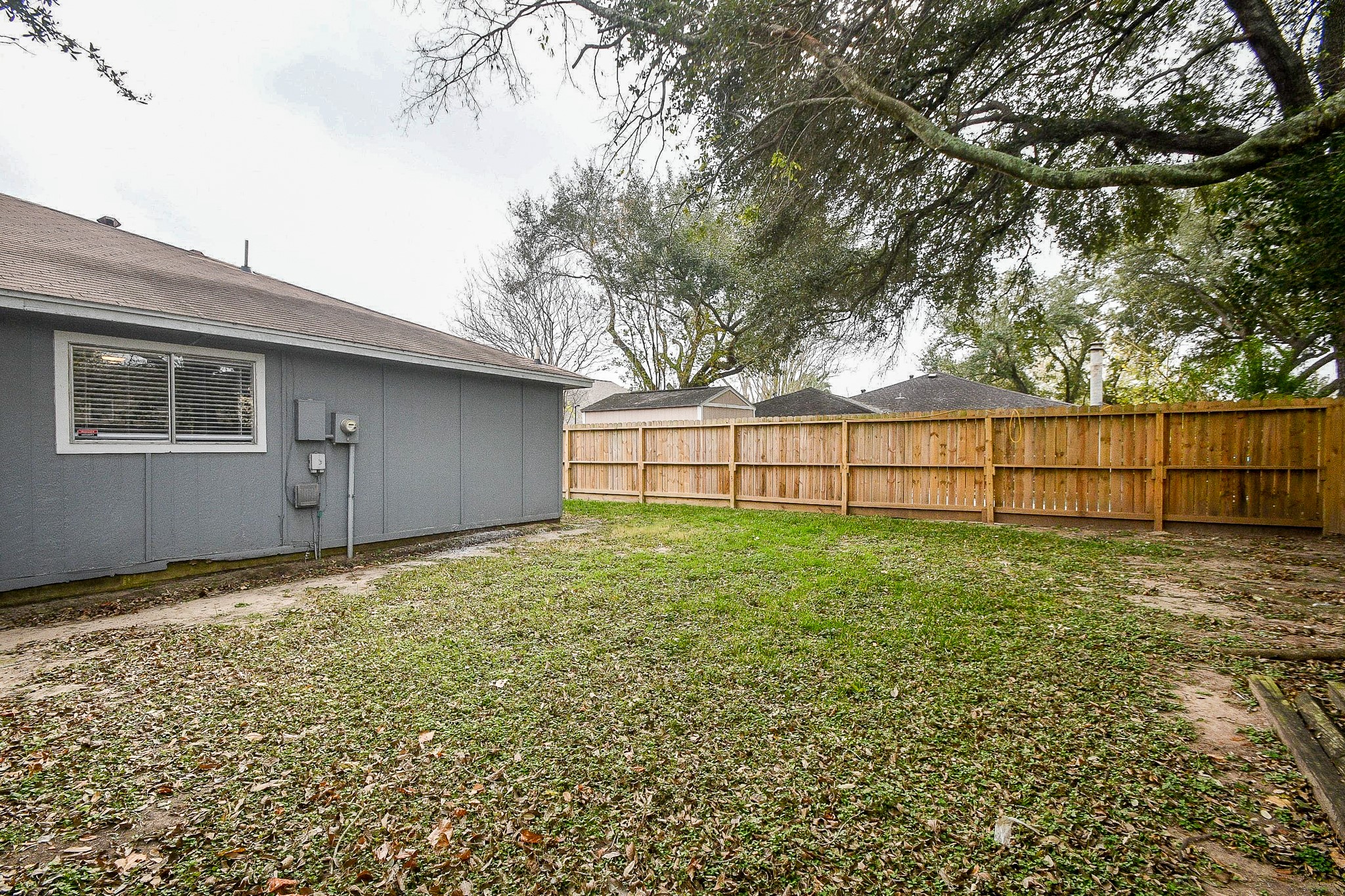 15315 Cedar Ridge Drive Houston, TX 77082 - Photo 20 of 20 a view of backyard with wooden fence