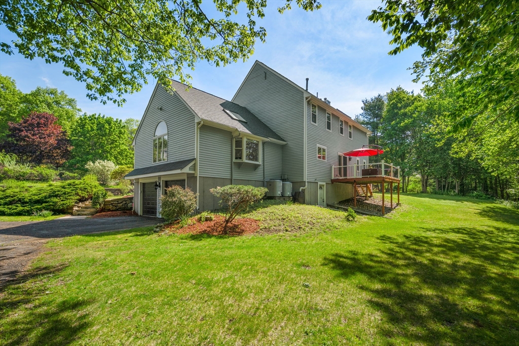 11 Cow Hill Road Sharon, MA 02067 - Photo 29 of 30 a house with garden in front of it