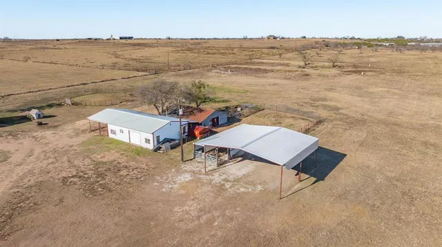a view of a lake with beach