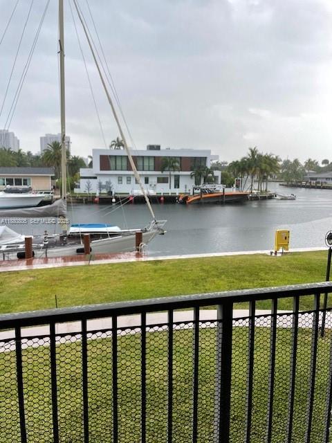 301 Golden Isles Drive, Unit 211 Hallandale Beach, FL 33009 - Photo 2 of 7 a view of a city and a lake view