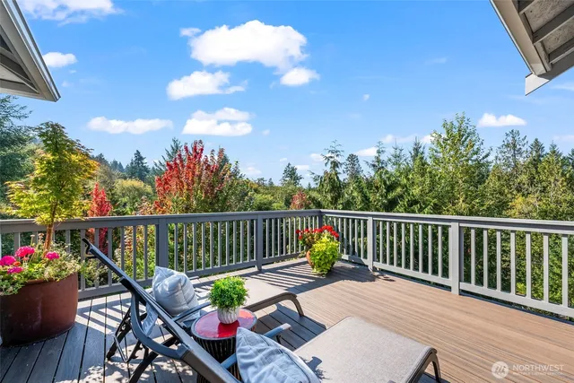 a view of a balcony with wooden floor
