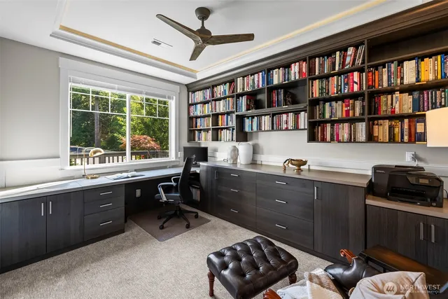 a room with furniture window and book shelf