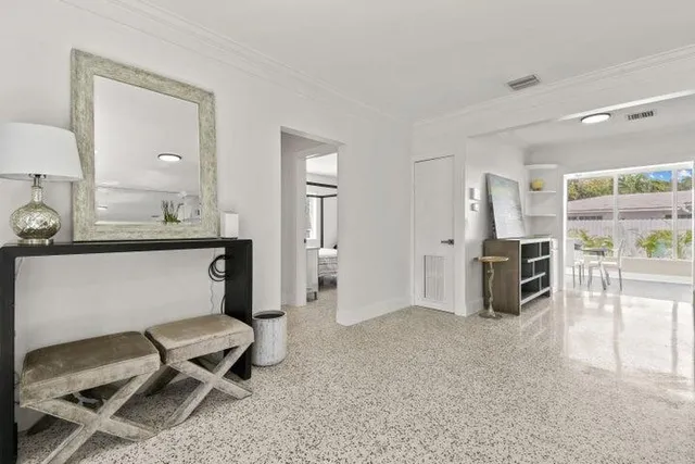 a room with furniture and a wooden floor