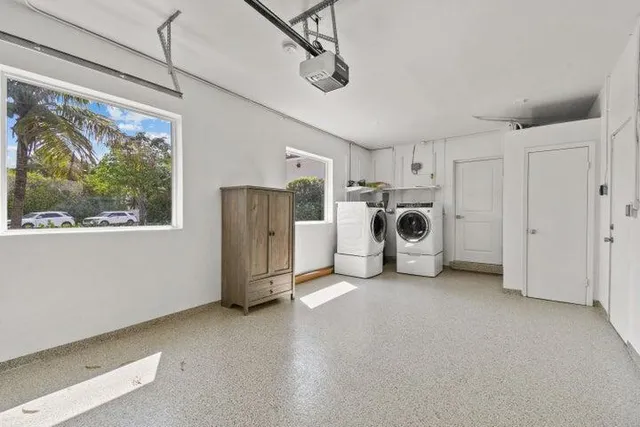 a view of a storage & utility room with a window