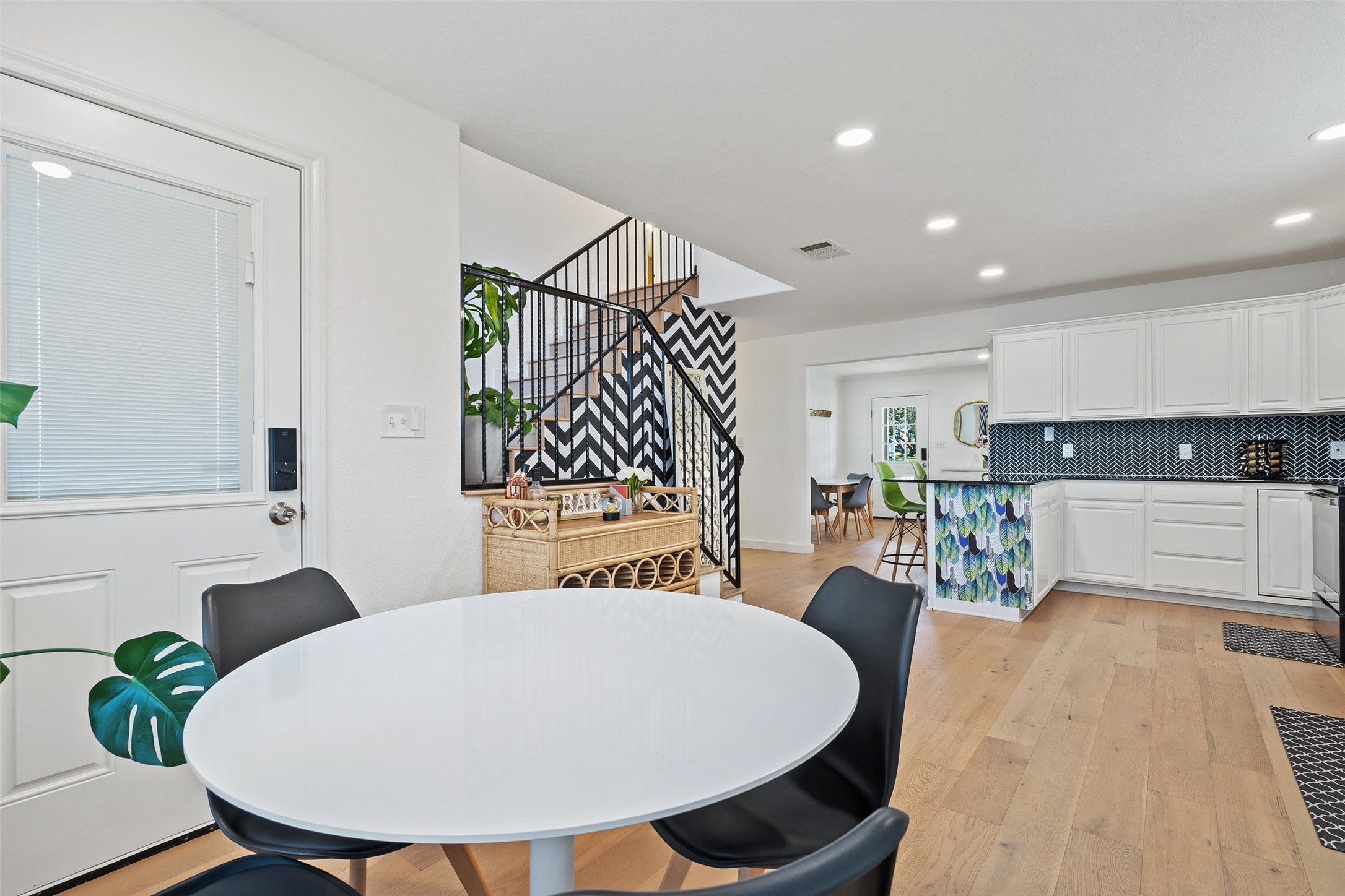 2012 Indian Creek Road Austin, TX 78734 - Photo 11 of 28 a view of kitchen island with furniture and wooden floor