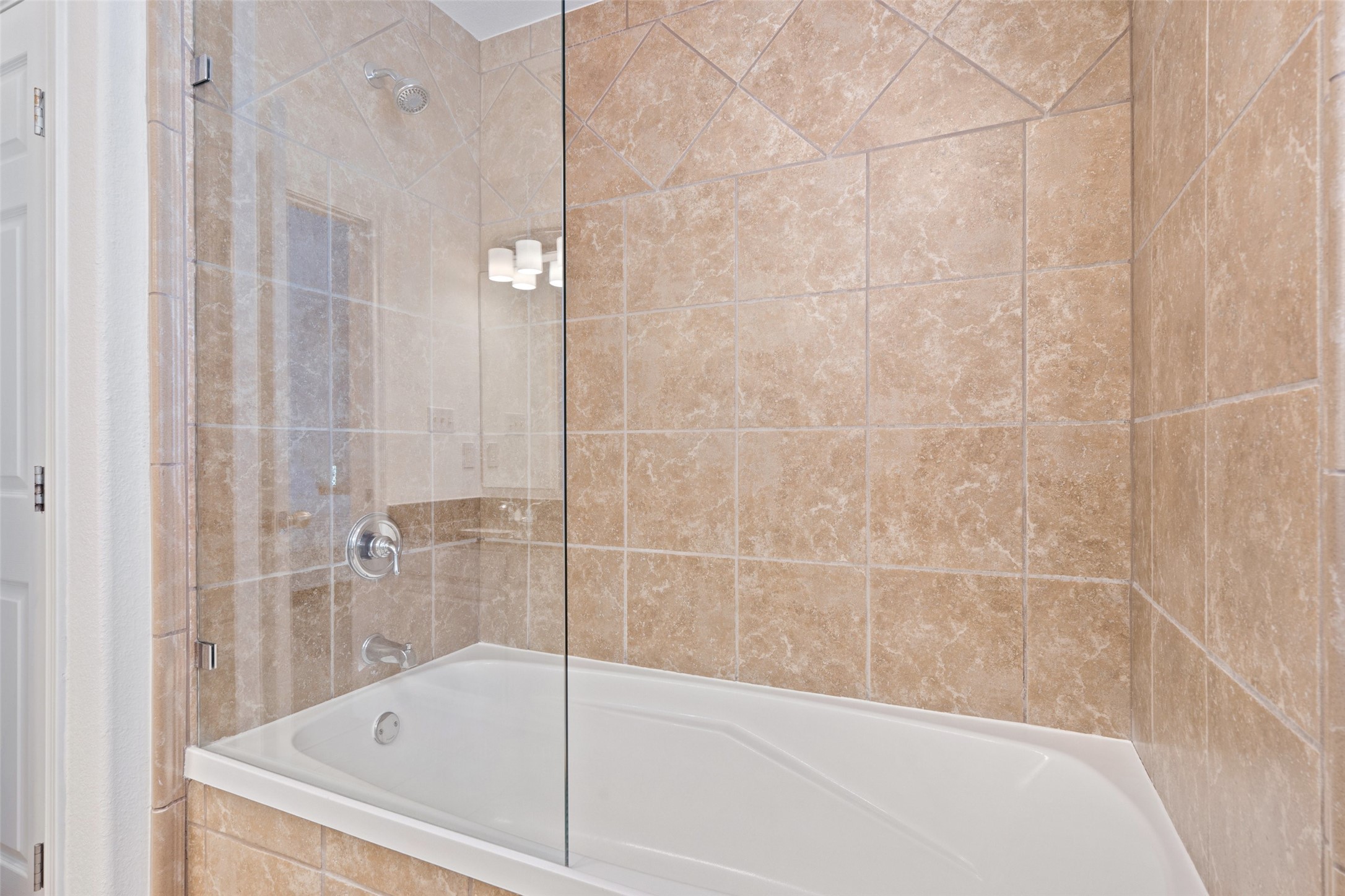 2012 Indian Creek Road Austin, TX 78734 - Photo 16 of 28 a bathroom with a bathtub
