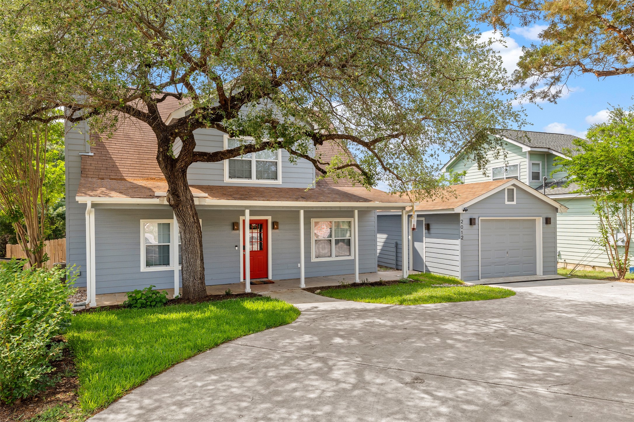 2012 Indian Creek Road Austin, TX 78734 - Photo 2 of 28 front view of a house with a yard