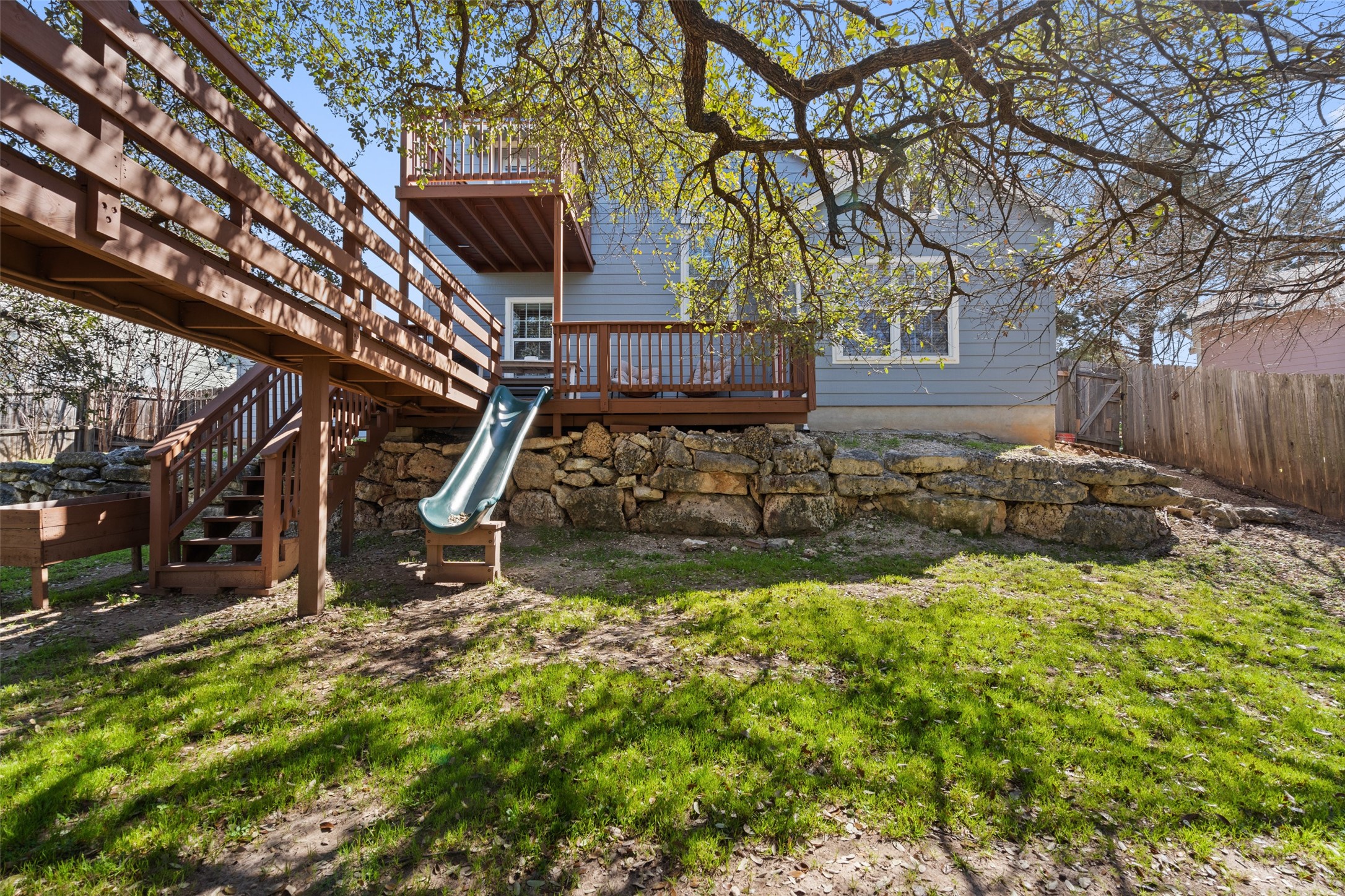 2012 Indian Creek Road Austin, TX 78734 - Photo 28 of 28 a view of a backyard with wooden fence
