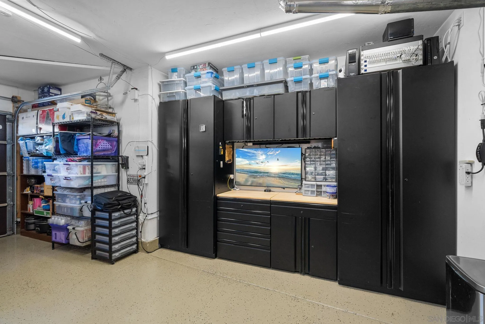6503 Plaza Ridge Road San Diego, CA 92114 - Photo 21 of 37 a kitchen with refrigerator and cabinets