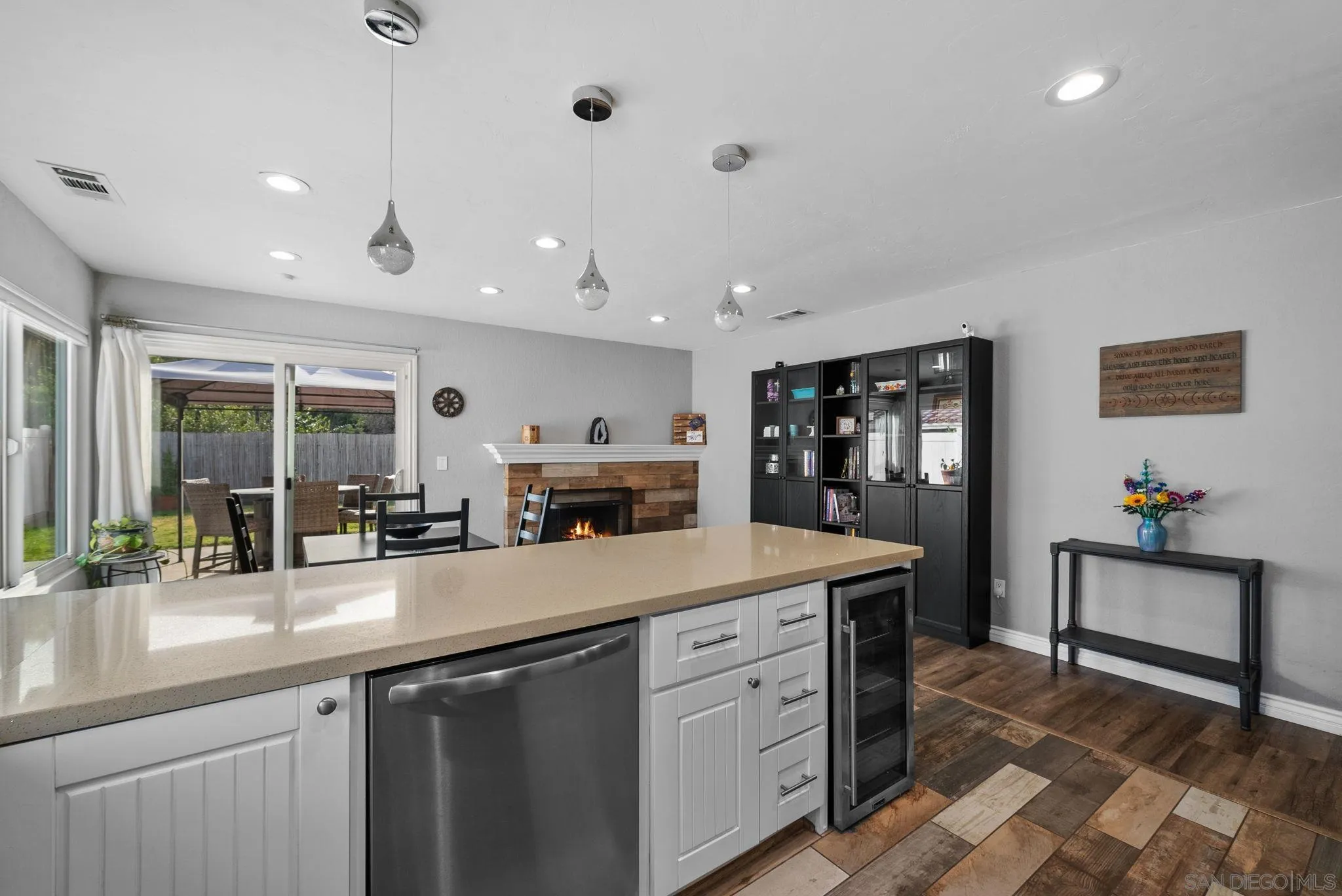 6503 Plaza Ridge Road San Diego, CA 92114 - Photo 8 of 37 a kitchen with sink a counter and cabinets