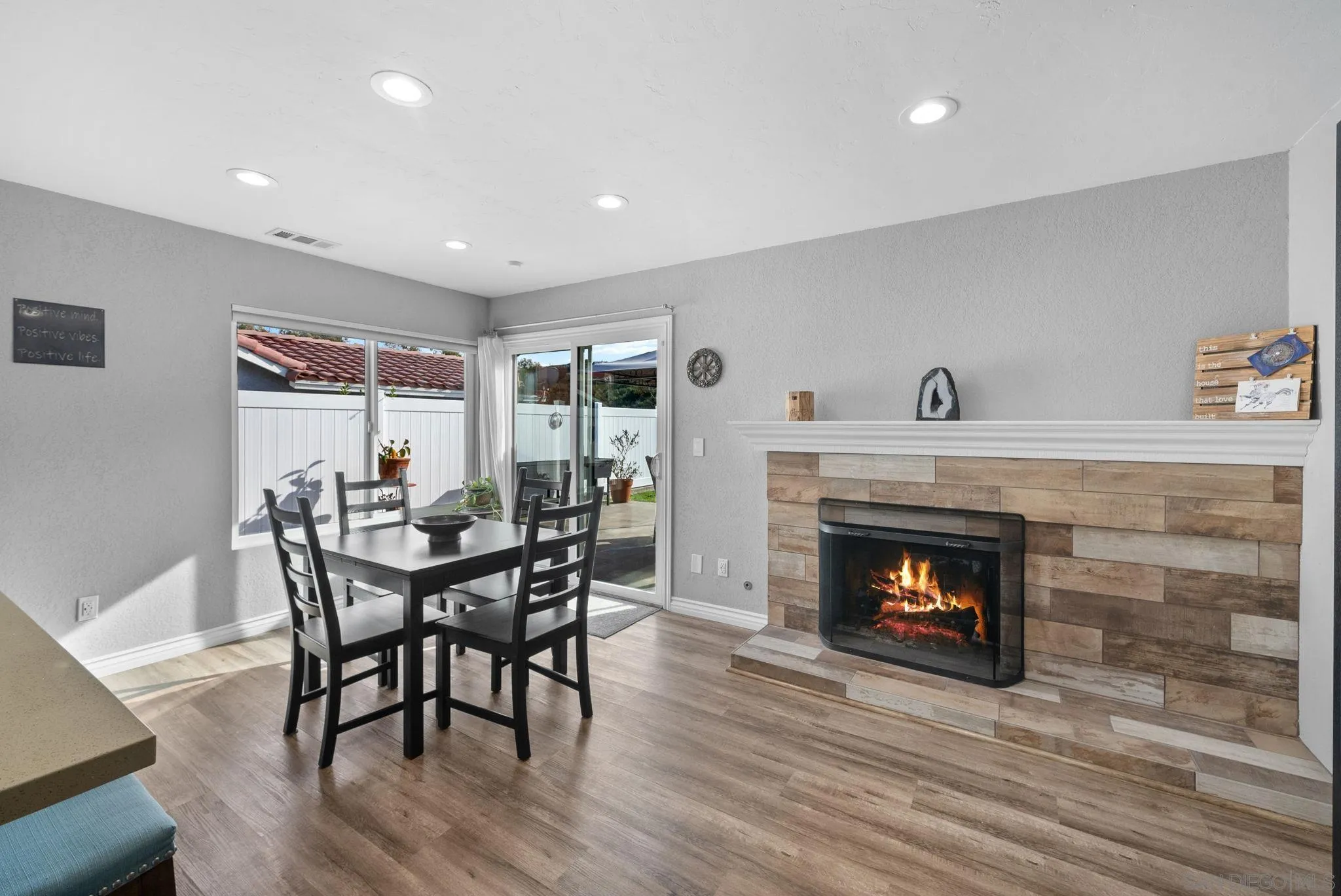6503 Plaza Ridge Road San Diego, CA 92114 - Photo 10 of 37 a view of a livingroom with furniture and a fireplace