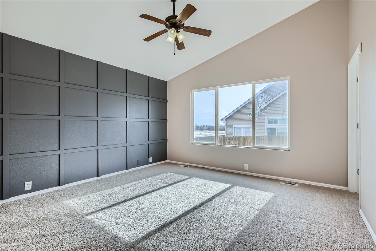 4296 Clover Lane Brighton, CO 80601 - Photo 16 of 35 a bedroom with a bed and a window