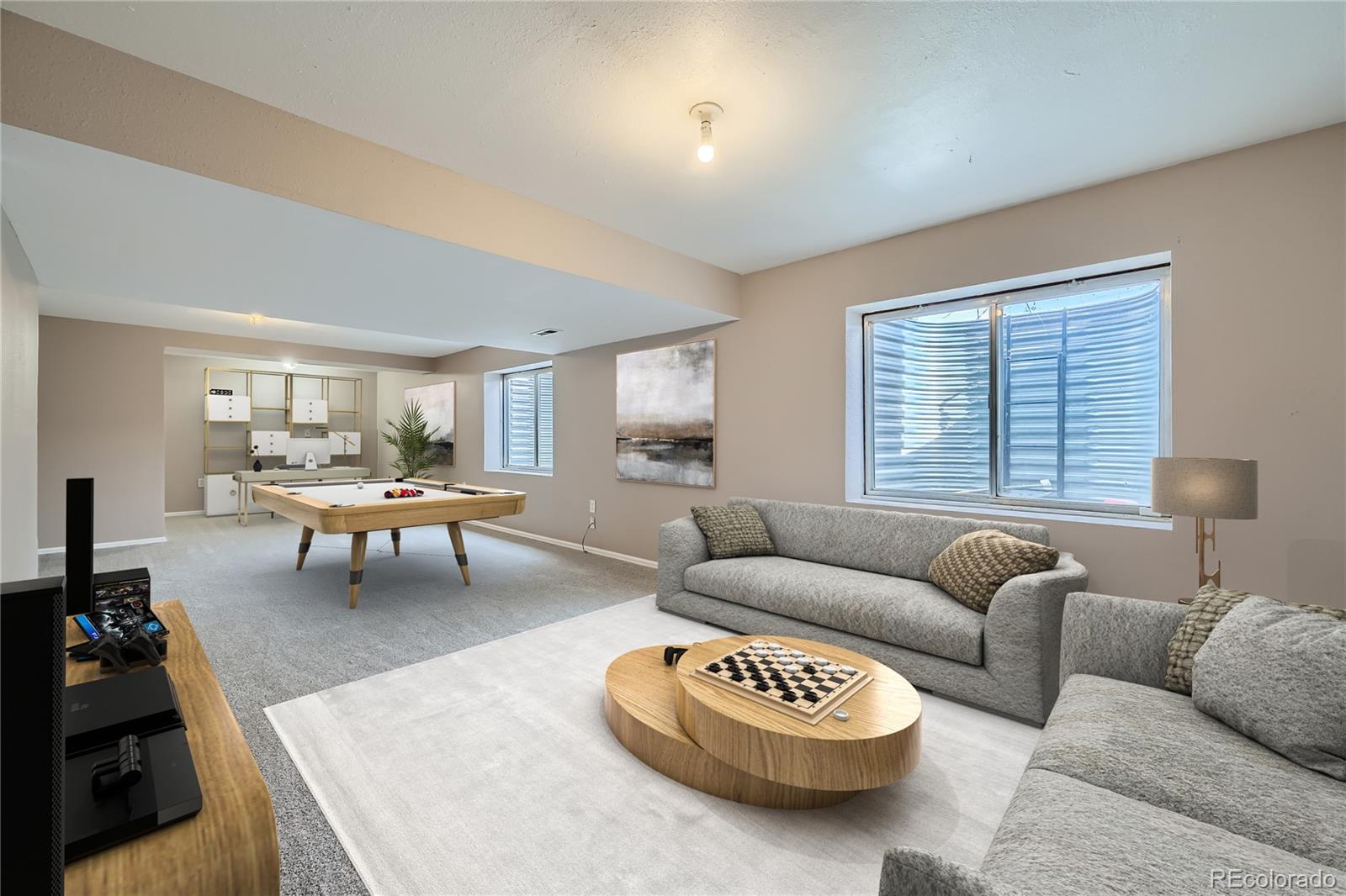 4296 Clover Lane Brighton, CO 80601 - Photo 27 of 35 a living room with furniture and a large window