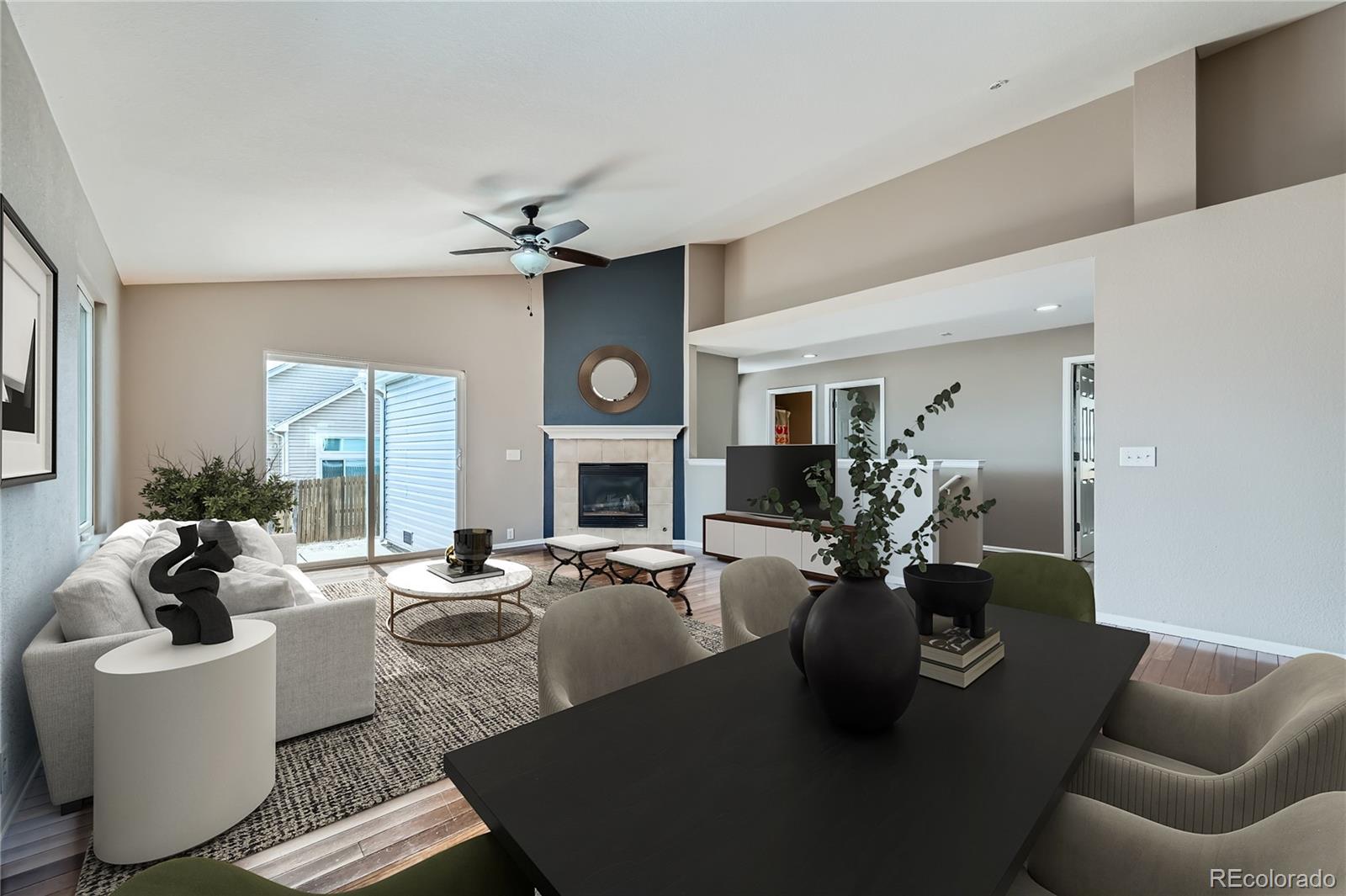 4296 Clover Lane Brighton, CO 80601 - Photo 6 of 35 a living room with fireplace furniture and a large window