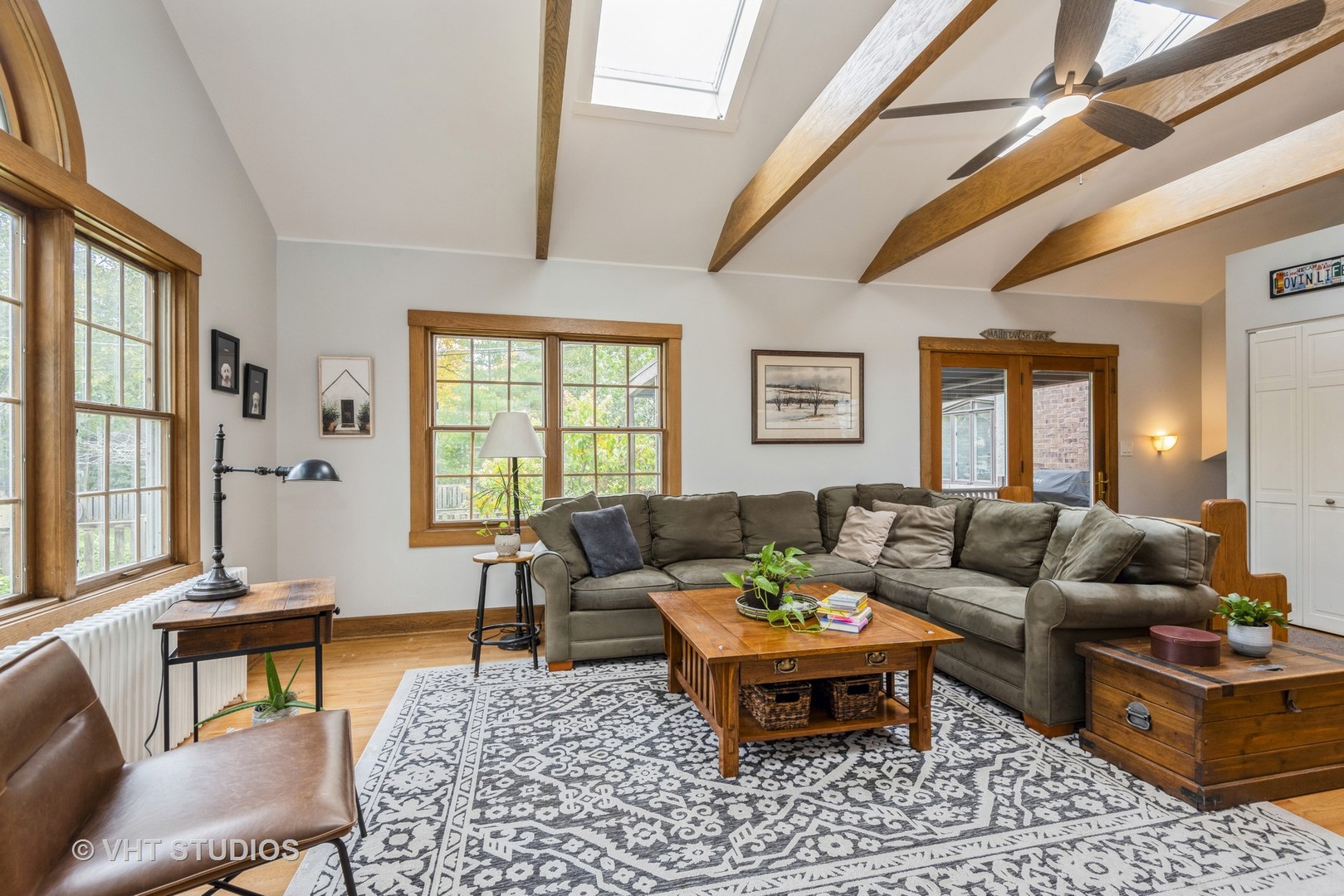2415 Harrison Street Evanston, IL 60201 - Photo 19 of 42 a living room with furniture wooden floor and a table