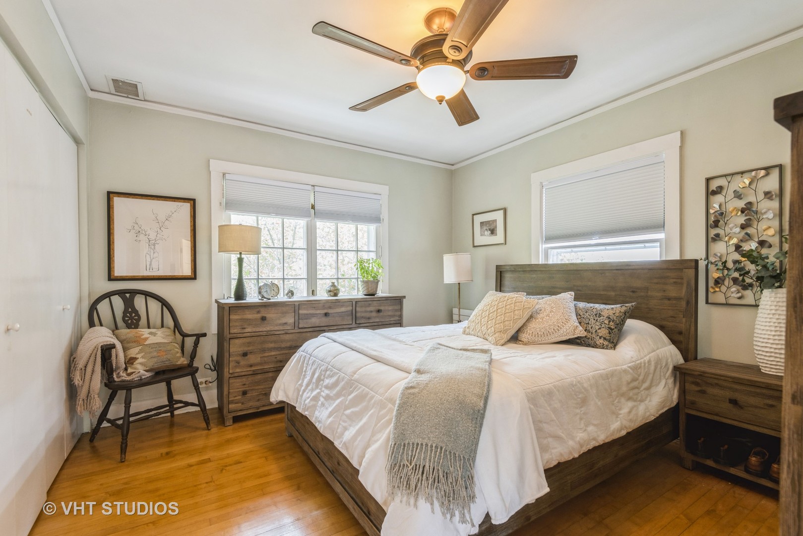 2415 Harrison Street Evanston, IL 60201 - Photo 22 of 42 a bedroom with a bed furniture and a window